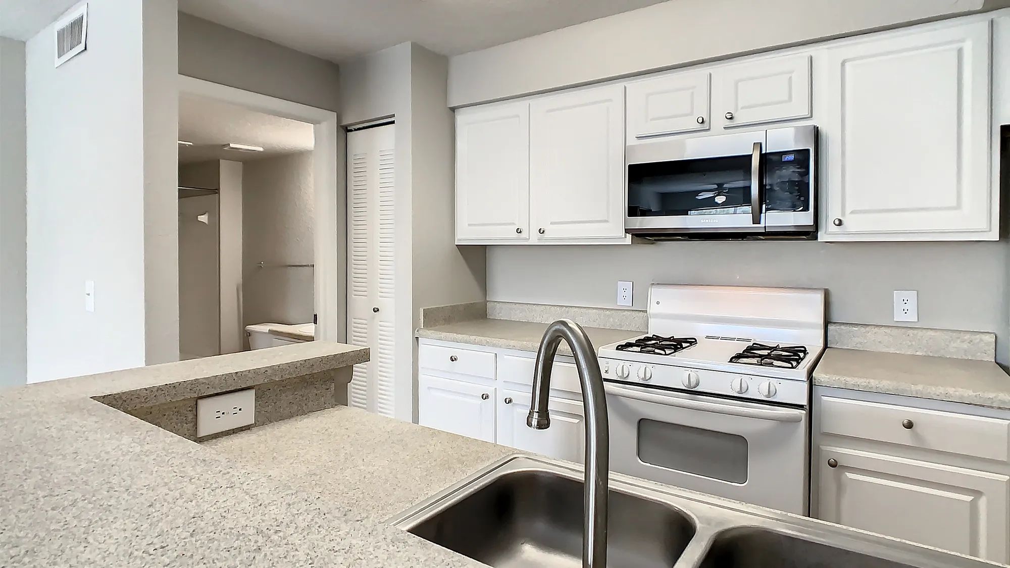 Our kitchens feature ample counter space and a breakfast bar.