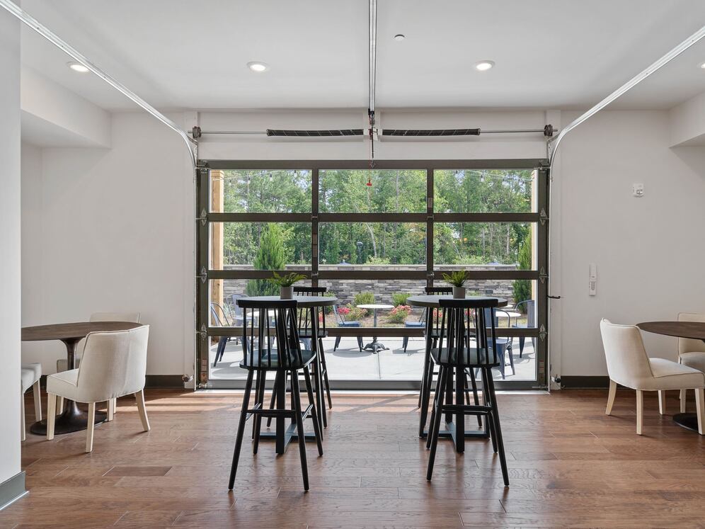 Resident lounge with retractable garage door