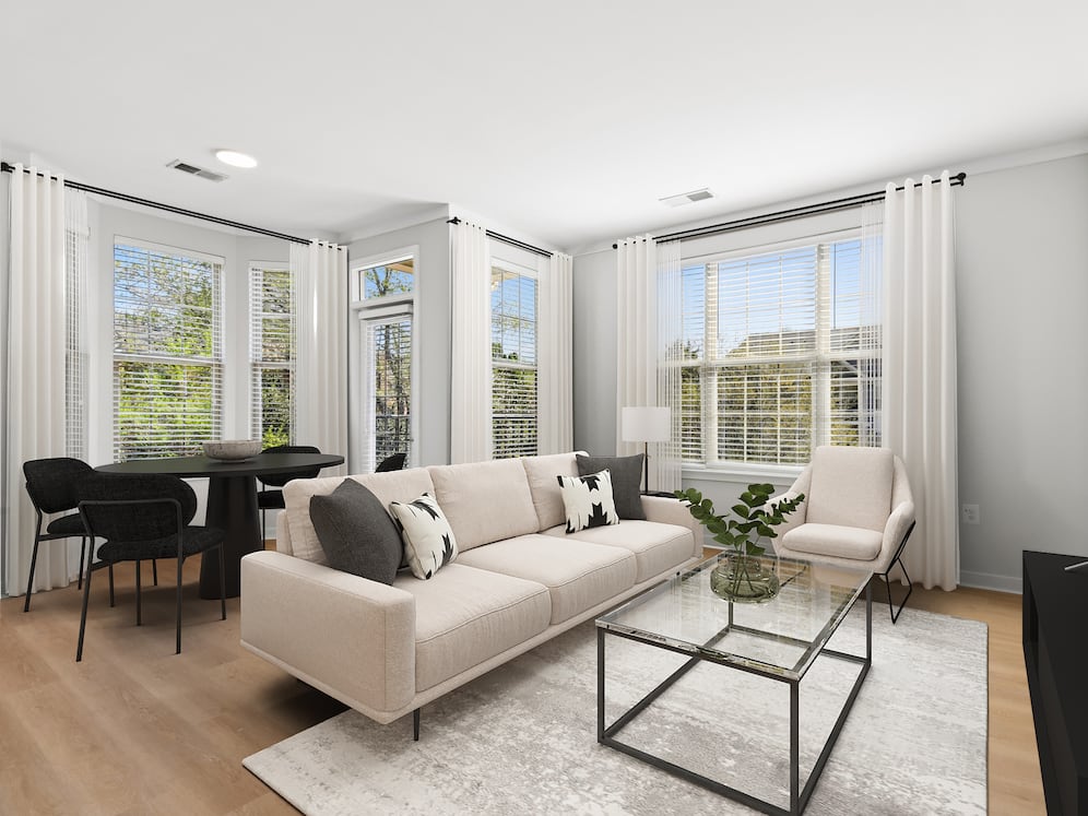 Renovated Package II dining and living room with hard surface flooring