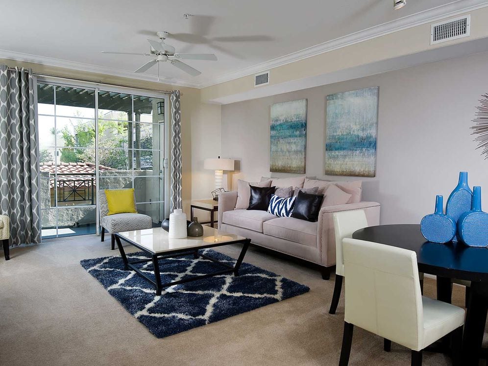 Classic Package I dining and living room with carpet