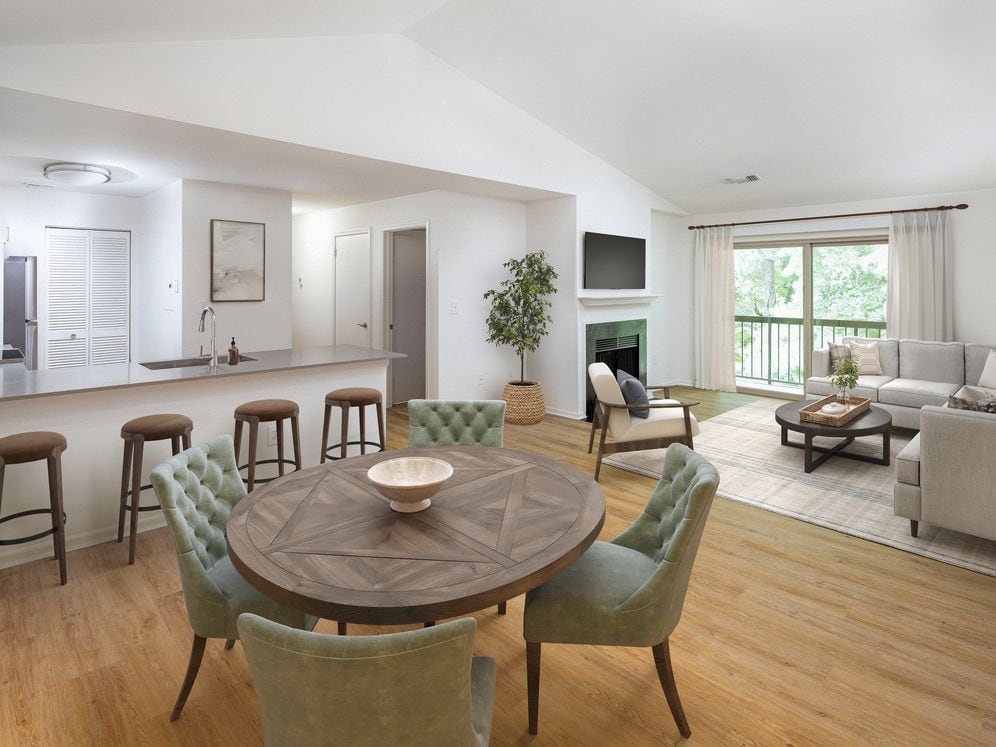 Renovated Package III dining and living room with hard surface flooring