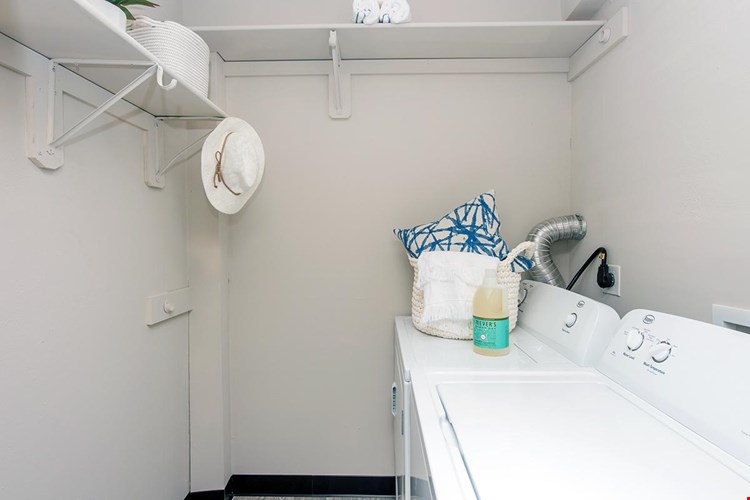 Full size washer and dryer appliances included in all apartment homes.