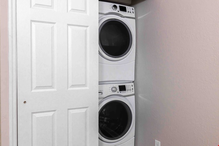 Embrace modern convenience with a full-size washer and dryer available for every apartment home at Boca Winds.