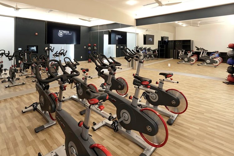 Fitness studio with spin bikes and Fitness on Demand™ programming