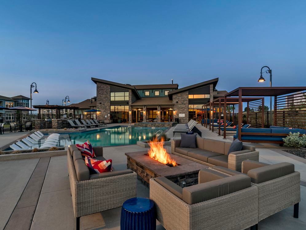 Swimming pool, sundeck with lounge seating and fireplace