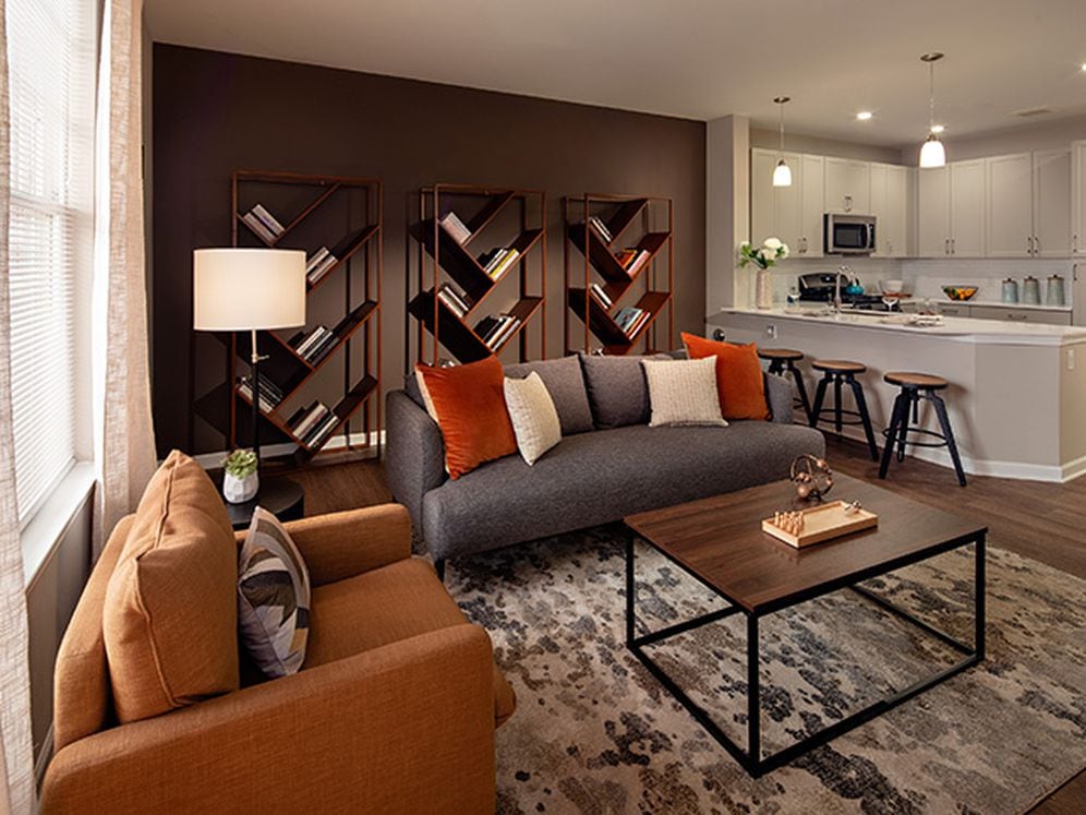 Kitchen, living, and dining areas with hard surface flooring